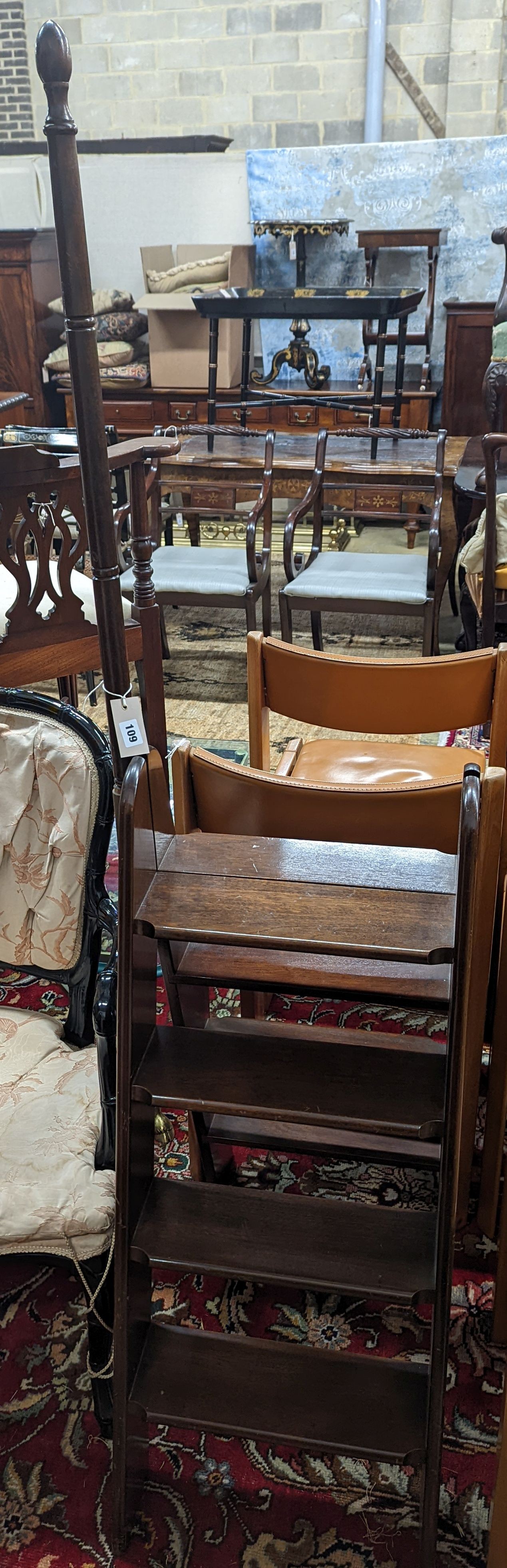 A pair of mahogany four tread folding library steps, width 44cm, 170cm